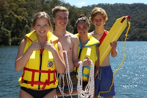 Group of adolescents wearing life jackets